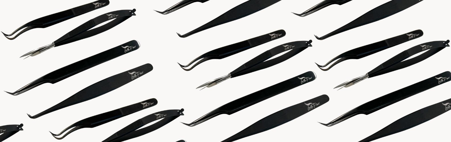 a picture of many black lash tribe tweezers on a white background