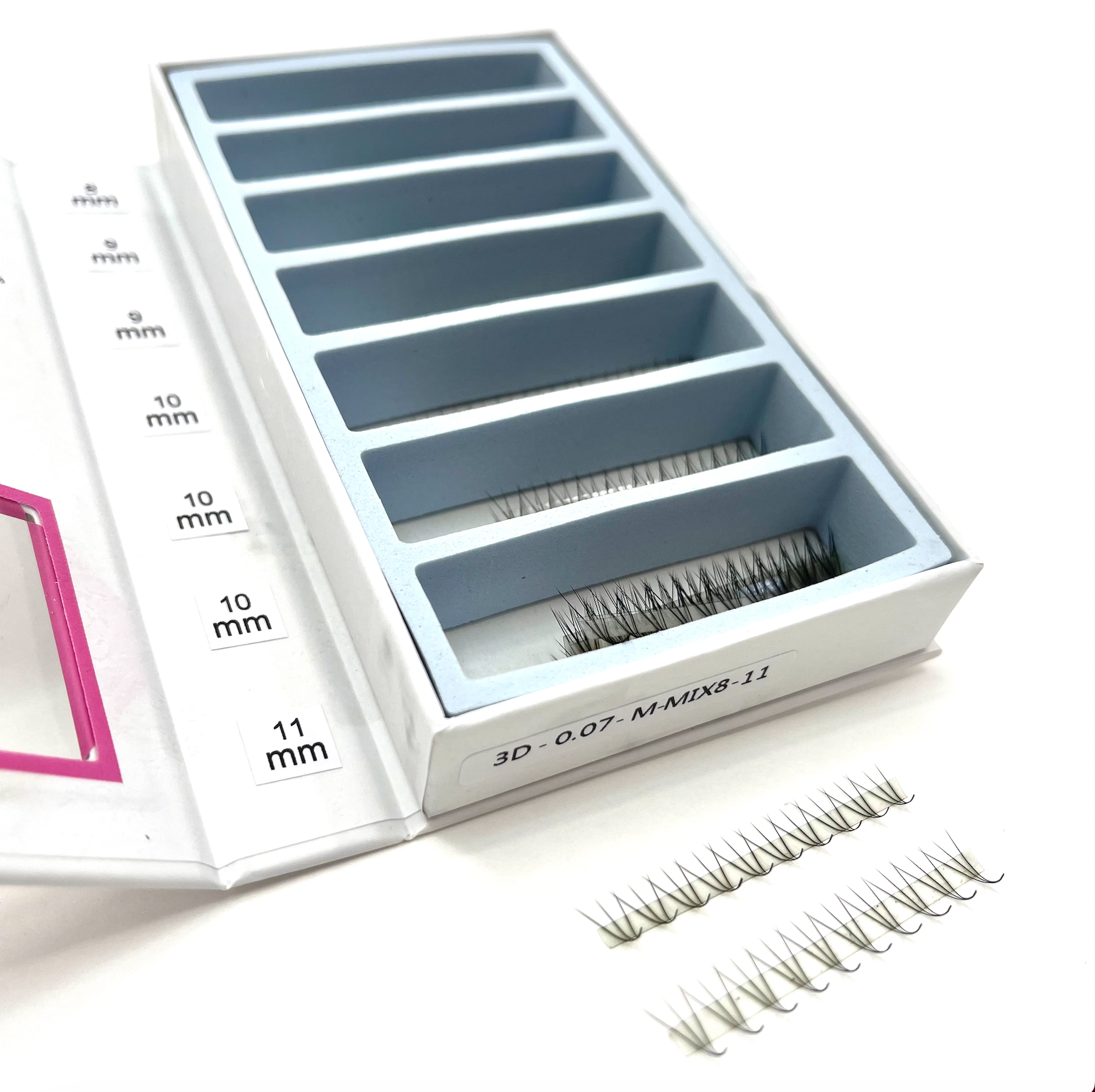 Pre-made Volume Fans on white background. Box of lash trtibe ultra speed fans and 2 strips of 3D fans in front. Open lash box