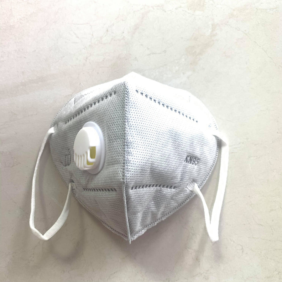 a Lash Tribe KN95 Medical Grade Mask with Valve on a white surface.