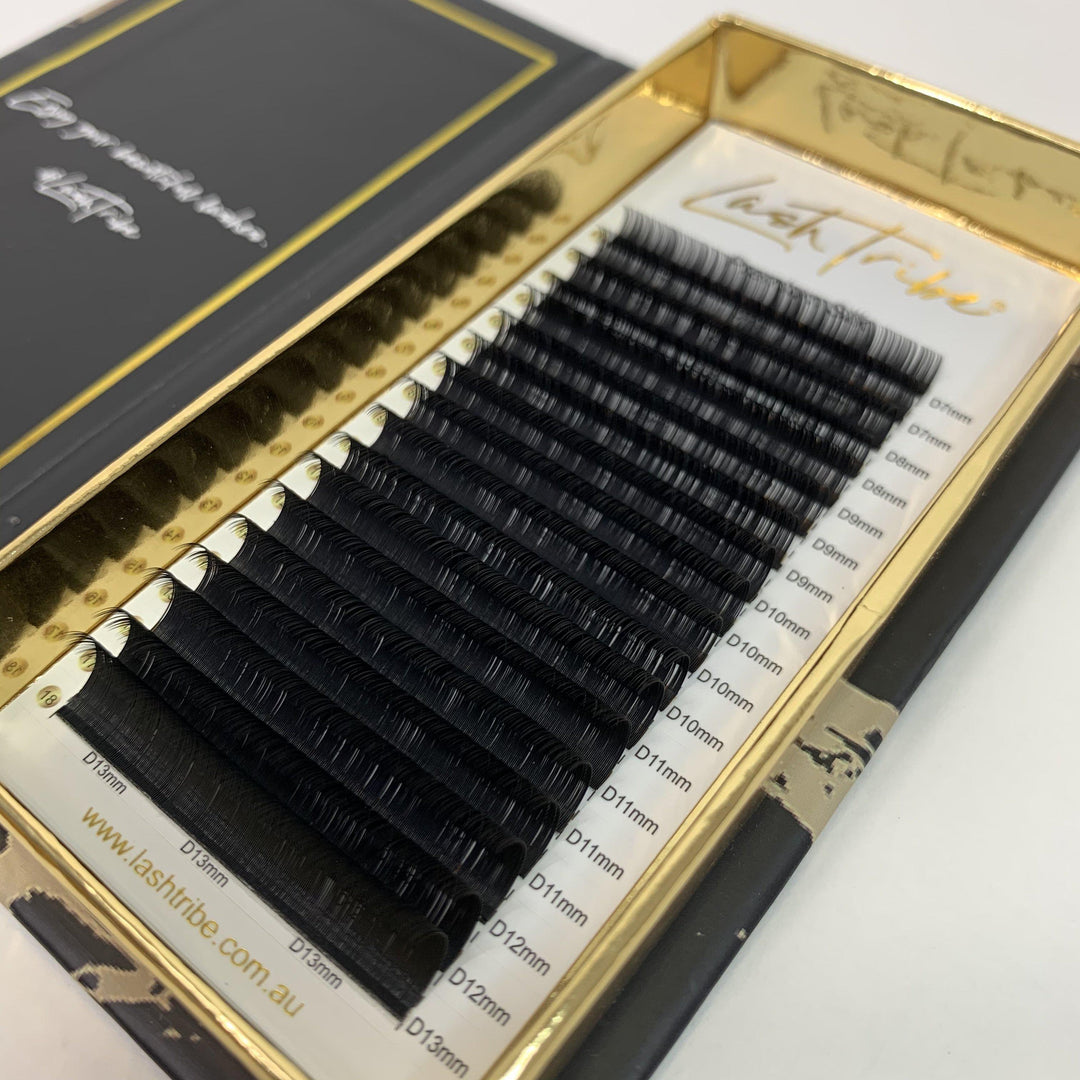 a set of EASY FAN LASHES | SELF FLOWERING EYELASH EXTENSIONS | JET BLACK in a Lash Tribe box.