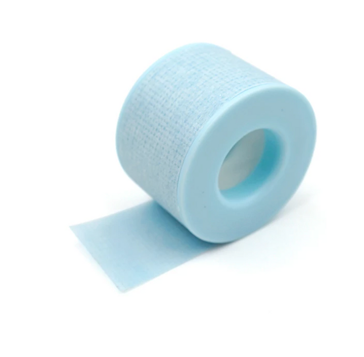 A roll of Blue Sensitive Tape by Lash Tribe on a white background.