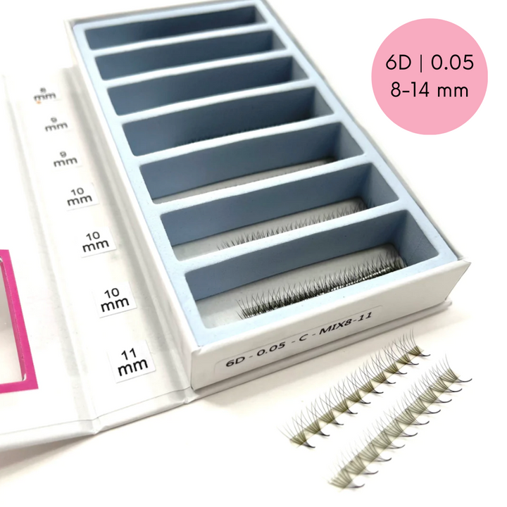 a box with a set of Lash Tribe Ultra Speed Premade Volume Fans | Long Stem | Ultra Black eyelash extensions in it.