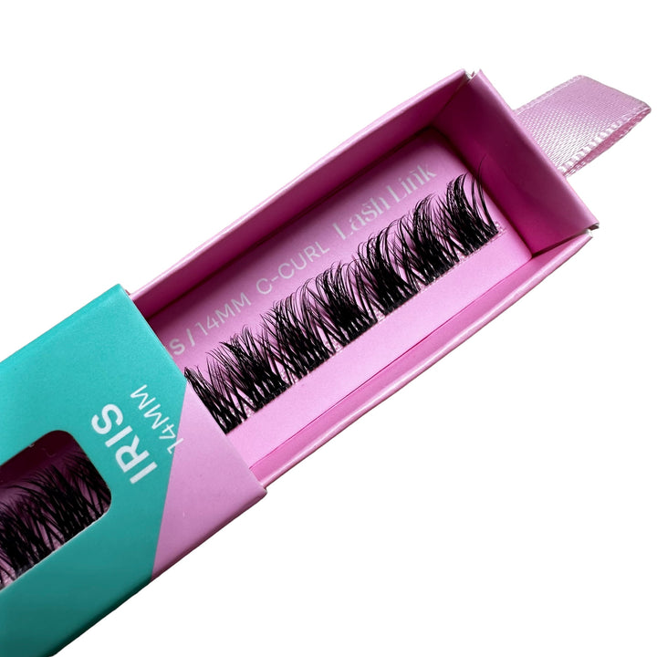 Box of "SPIKEY VOLUME | IRIS" eyelashes by Lash Link, with C-curl style. These 14mm extensions come packaged in striking pink and teal.
