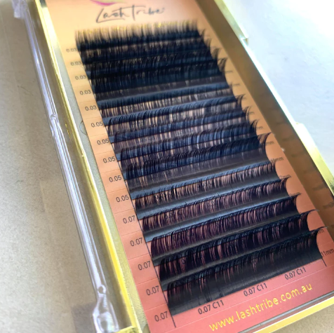 A box of MIXED Trays Classic and Volume Lashes by Lash Tribe, reduced to clear.