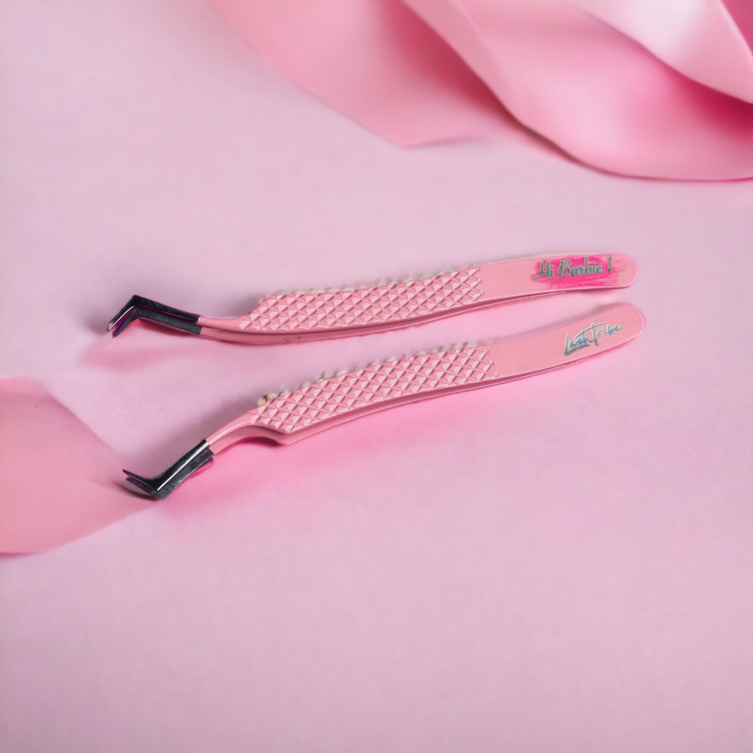 Two Limited Edition | Barbie Collection Nano Fibre Russian Volume Tweezers on a pink background. (Lash tribe )