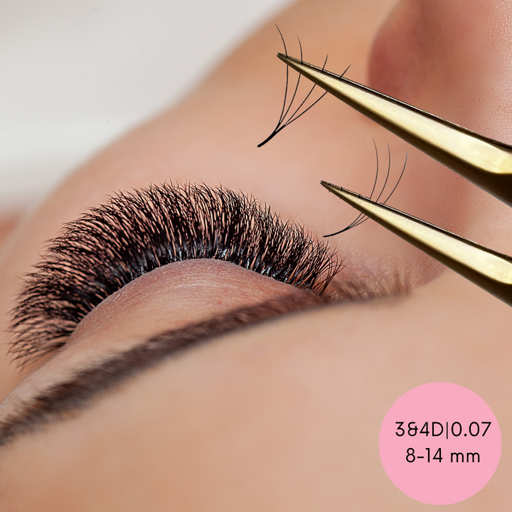 A woman's eyelashes are being trimmed with a pair of Speed Volume Fans | Instant Setup Promade Volume Fans Bundle by Lash Tribe tweezers.