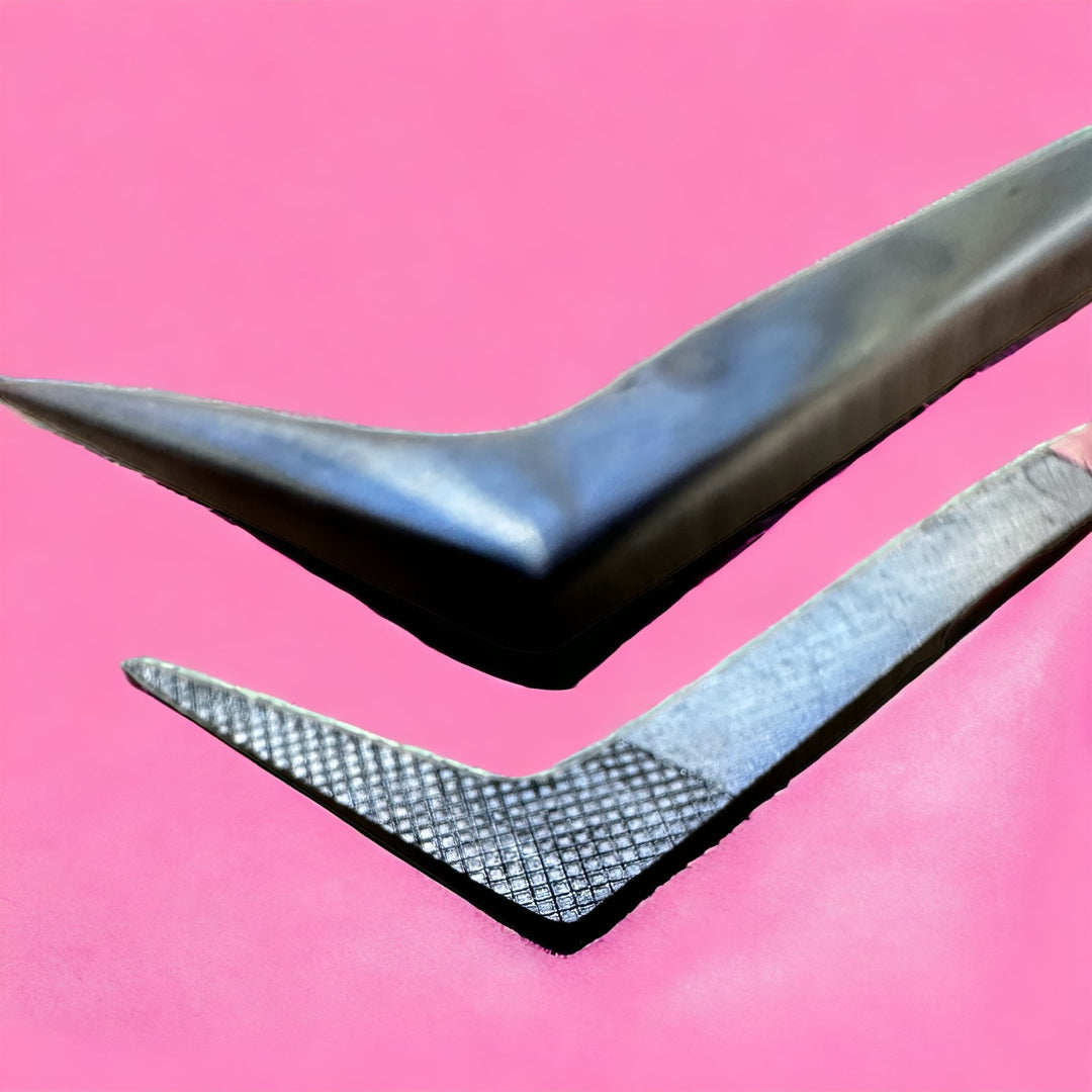 A pair of Limited Edition | Barbie Collection Nano Fibre Russian Volume Tweezers by Lash Tribe on a pink background.