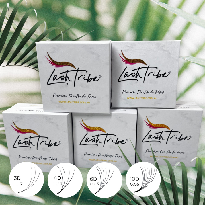 four boxes of Lash Tribe's Loose Promade Volume Fans Bundle | Eyelash Extension Volume Fans with a palm tree in the background.