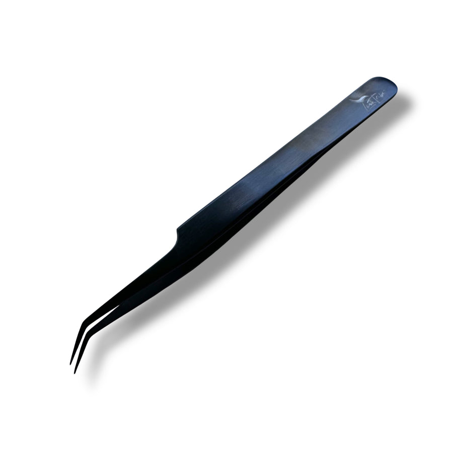 The Lash Tribe Classic Angled Isolation Tweezers feature a fine, curved tip in black, ideal for eyelash extensions. Perfect for precise isolation, they are shown on a white background with a soft shadow.