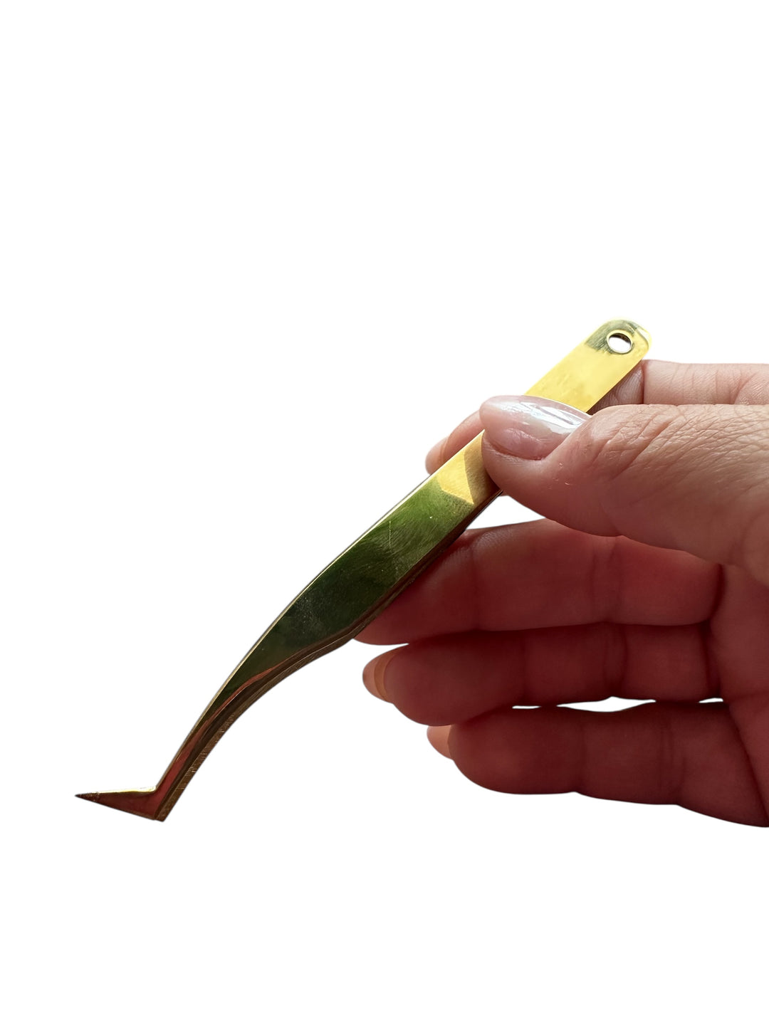 A hand holds the Lash Tribe Classic Duo - Lash Tweezers | Pickup and Isolation, gold-colored, for eyelash extensions, against a white background.