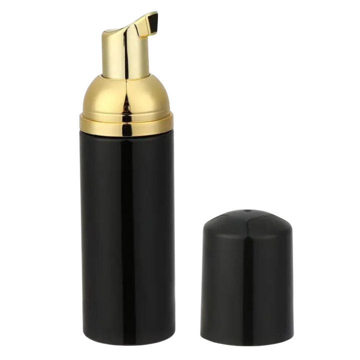 A black 50ml Foaming Bottle with a gold lid by Lash Tribe.