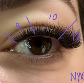 Close-up of an eye showcasing the full volume style of Lash Link's NYX lash extensions; lengths are 8, 10, and 12, with "NYX" by Lash Link in the bottom right.