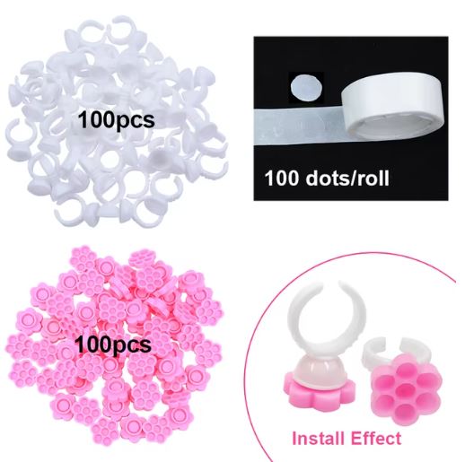 The image displays 100 Lash Tribe white circular lash glue holders, a roll of adhesive dots, and 100 pink flower-shaped Lash Glue Holder Flower Cups. A close-up highlights a white holder with a pink insert in use. Perfect for organizing your glue wells with style and efficiency.