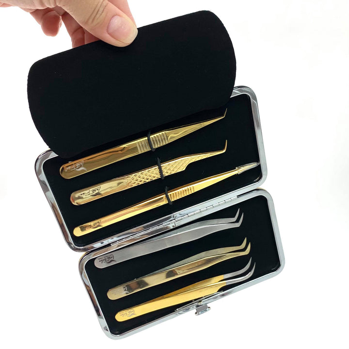 a person holding a Lash Tribe Magnetic Tweezer Case.