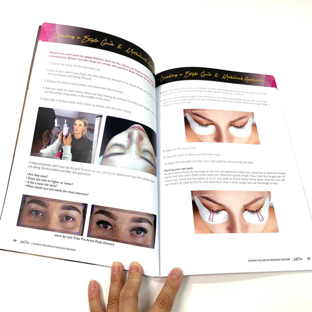 A person is holding "Russian Volume Eyelash Extensions Manual" by Lash Tribe with instructions on how to make eyelashes.