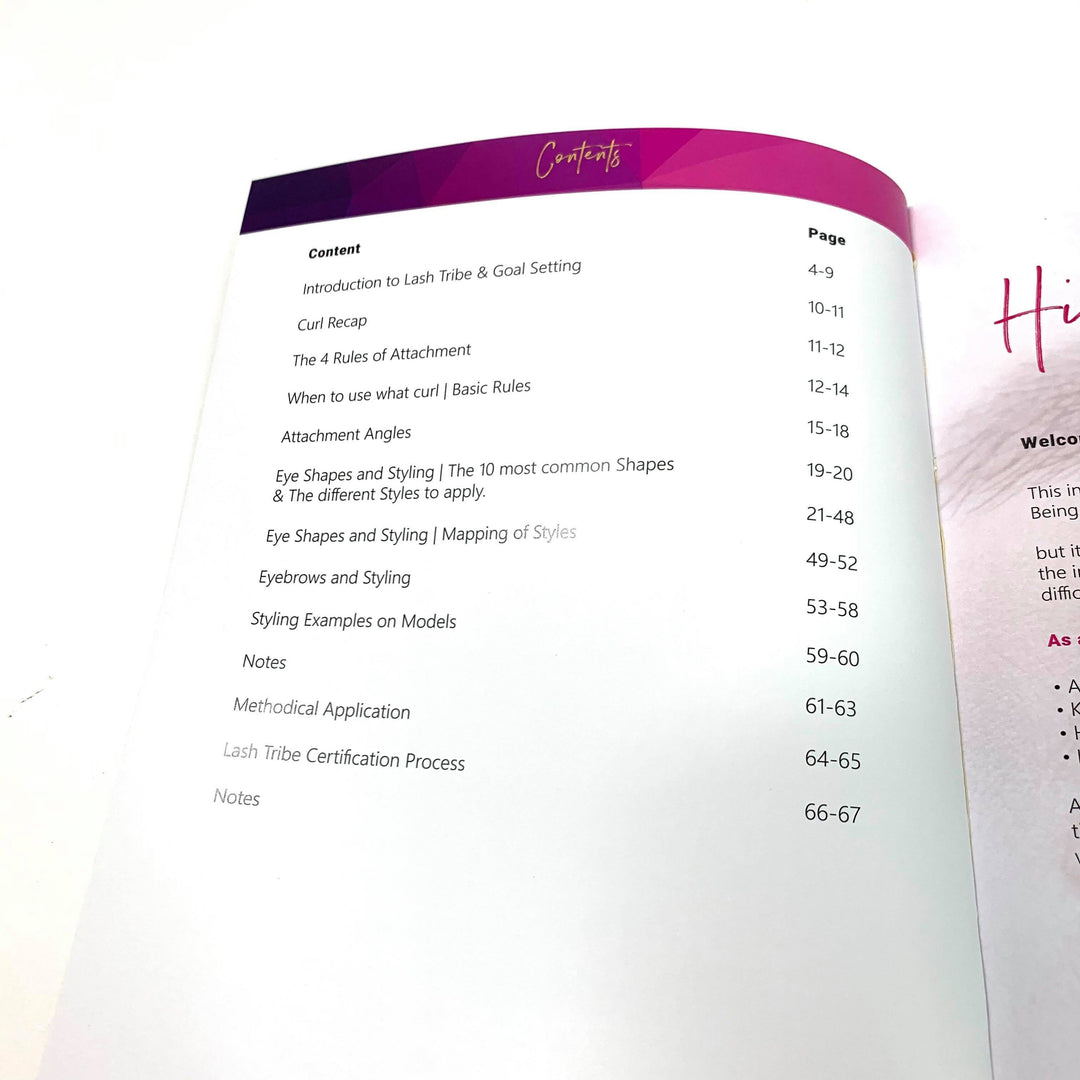 An Eye Shapes & Styling Training | Lash Manual (E-Book) by Lash Tribe with a pink cover is open on a table.