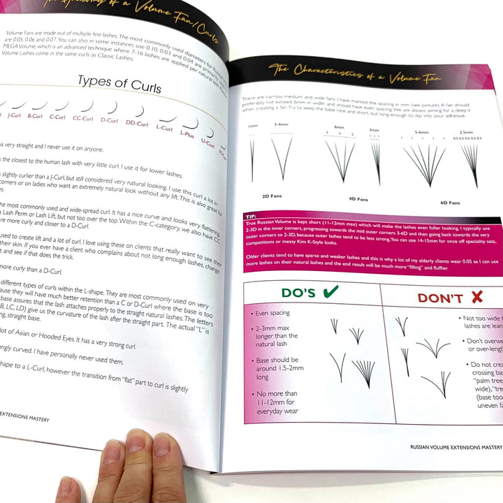 A person is holding a Lash Tribe Russian Volume Eyelash Extensions Manual (Hardcopy) with instructions on how to make eyelashes.