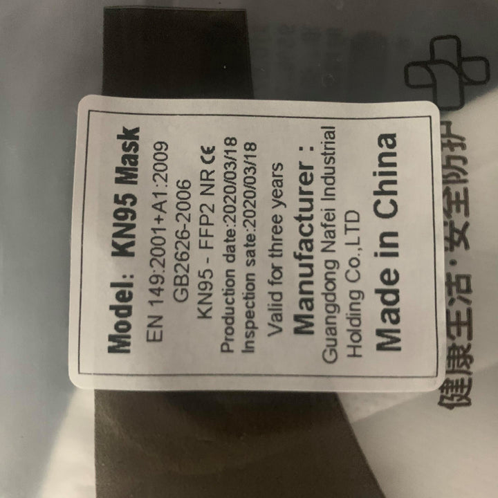 a label on a plastic bag with a Lash Tribe KN95 Medical Grade Mask label on it.