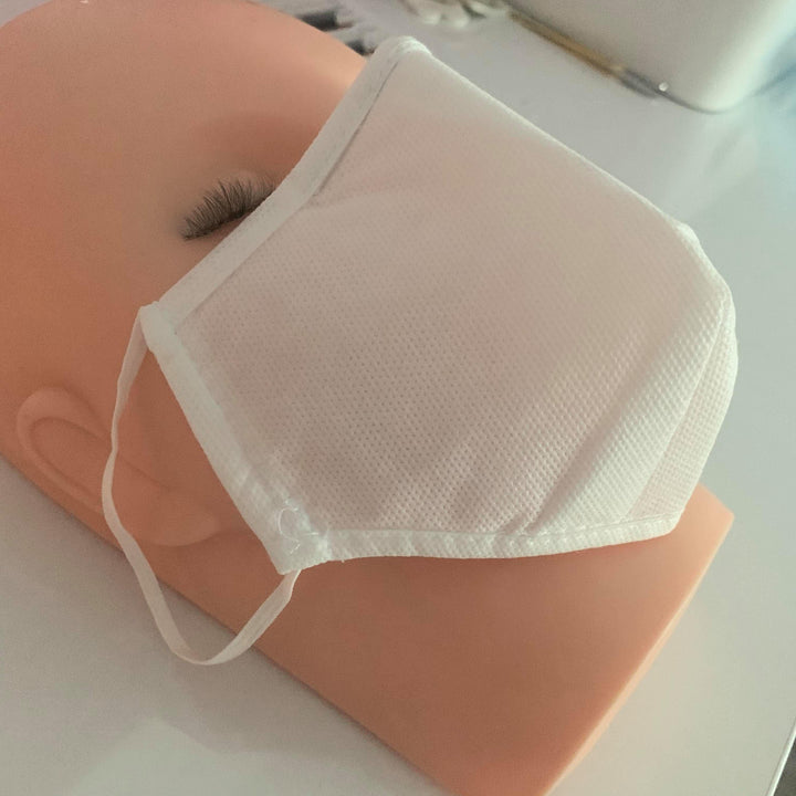 a mannequin wearing a Lash Tribe KN95 Medical Grade Mask.