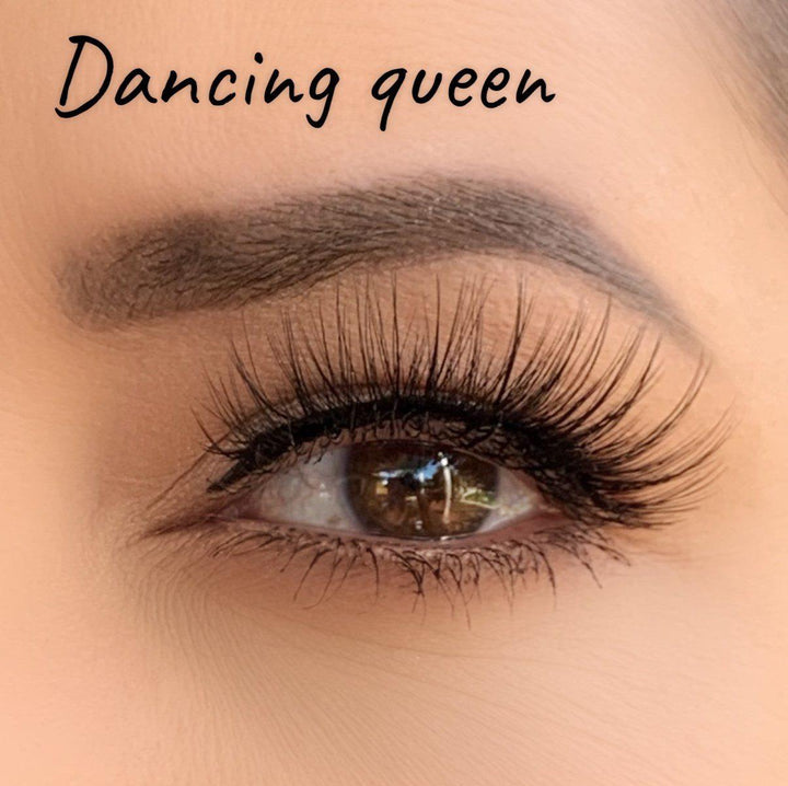 a woman's eye with long Silk Magnetic Lashes from Lash Tribe and the words dancing queen.