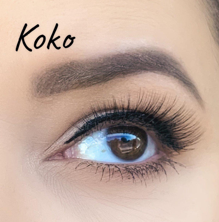 A woman's eye with long lashes and the word koko, adorned with Silk Magnetic Lashes from Lash Tribe.