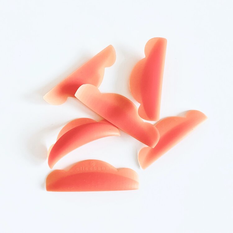 a group of Elleebana Extreme Styling Shields on a white surface.
