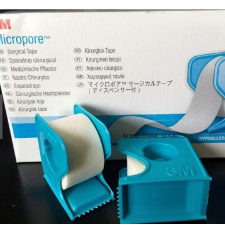 two rolls of 3M Micropore Lash Tape in front of a box.