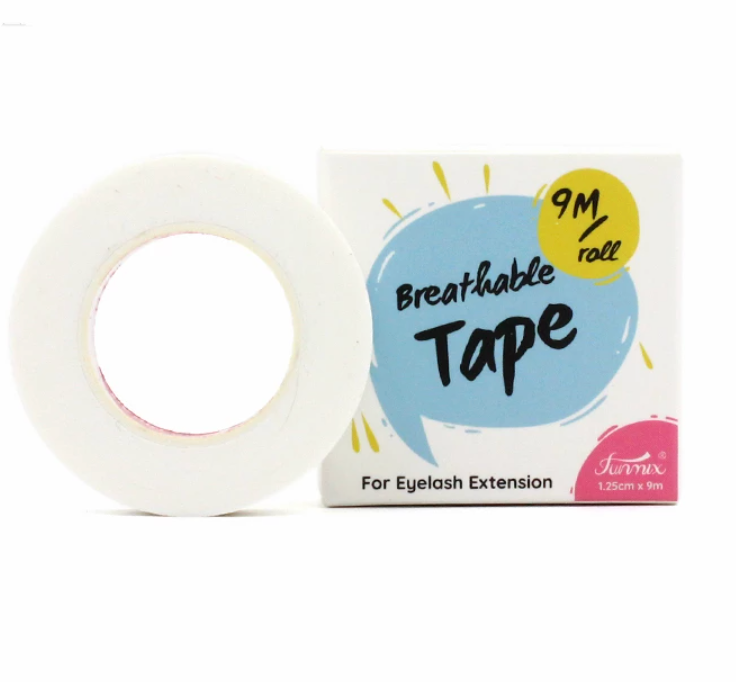 A box of Japanese Comfort Lash Tape with a white box by Lash Tribe.