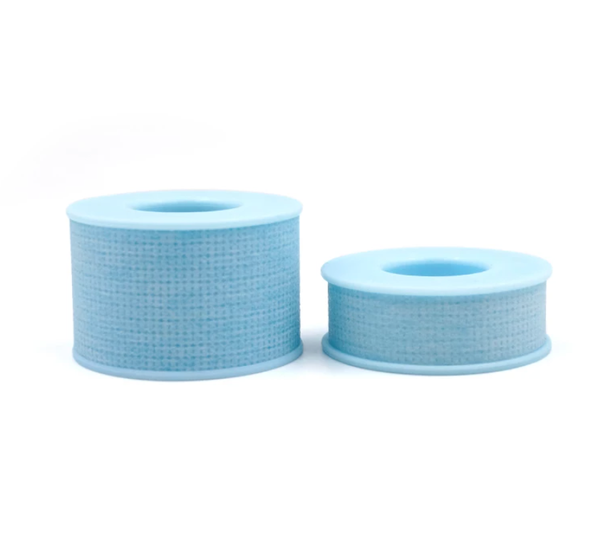 Two rolls of Blue Sensitive Tape by Lash Tribe on a white background.