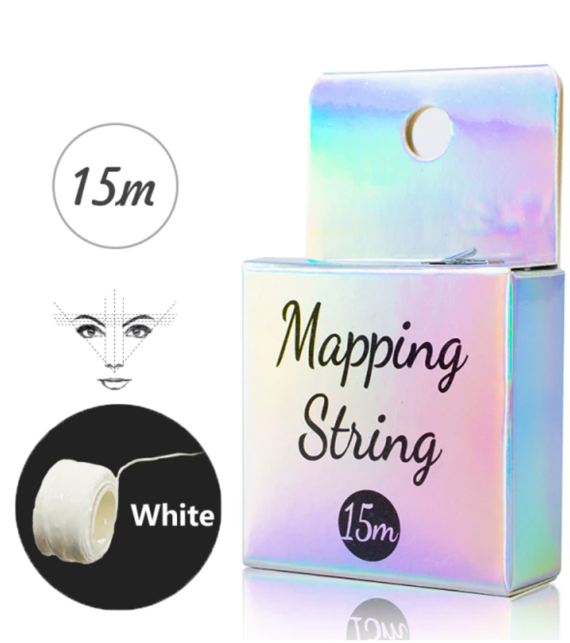 A white box with Lash Tribe's Brow Mapping String on it.