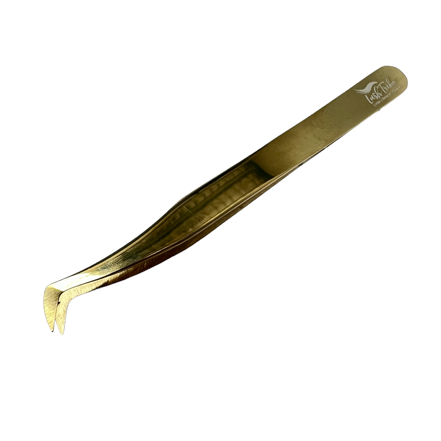 A Perfect Russian Volume Tweezer by Lash Tribe, gold plated, on a white background.