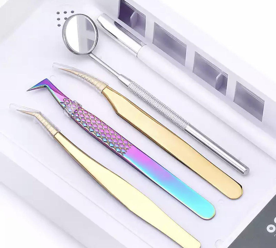 a set of Lash Tribe Tweezer and Tile UV Steriliser, Lash Tribe tweezers, and Lash Tribe tweezers in a box.