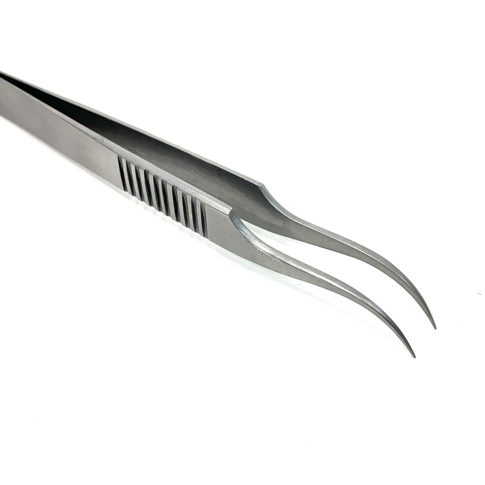 a pair of Lash Tribe Volume Master | Curved Precision Tweezers on a white background.