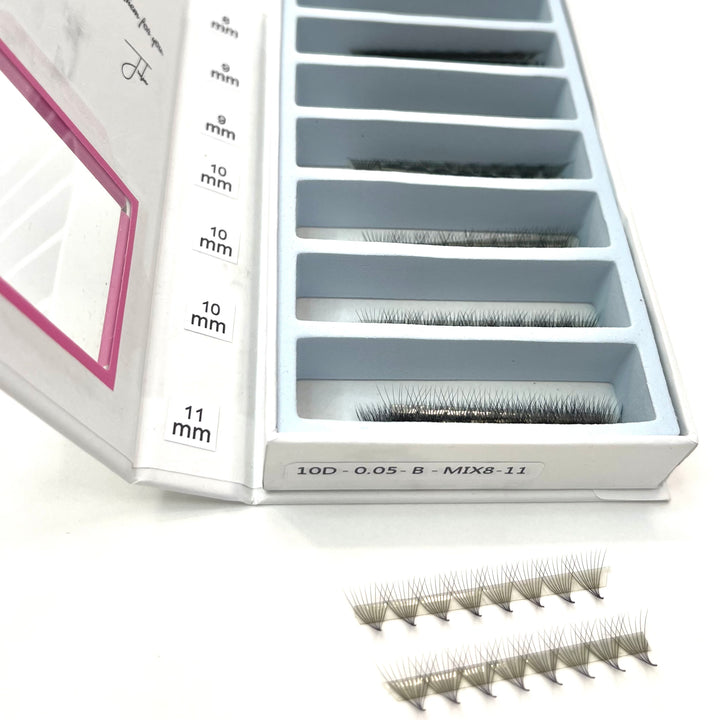 a box of Lash Tribe Ultra Speed Premade Volume Fans | Long Stem | Ultra Black false eyelashes in a white box.