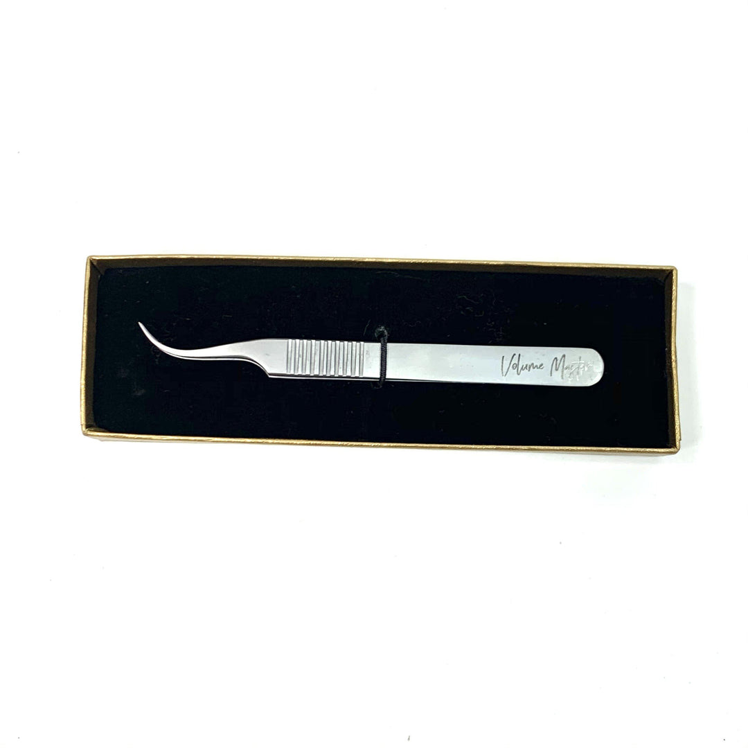 a Volume Master | Curved Precision Tweezer by Lash Tribe in a gift box.