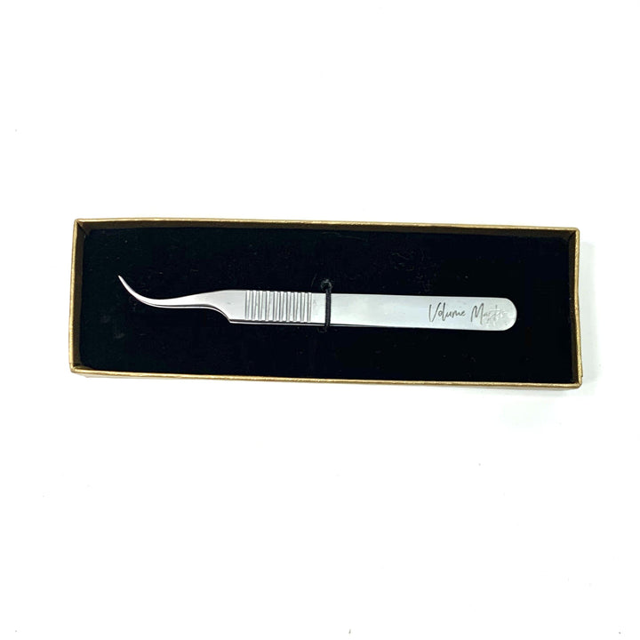 a Volume Master | Curved Precision Tweezer by Lash Tribe in a gift box.