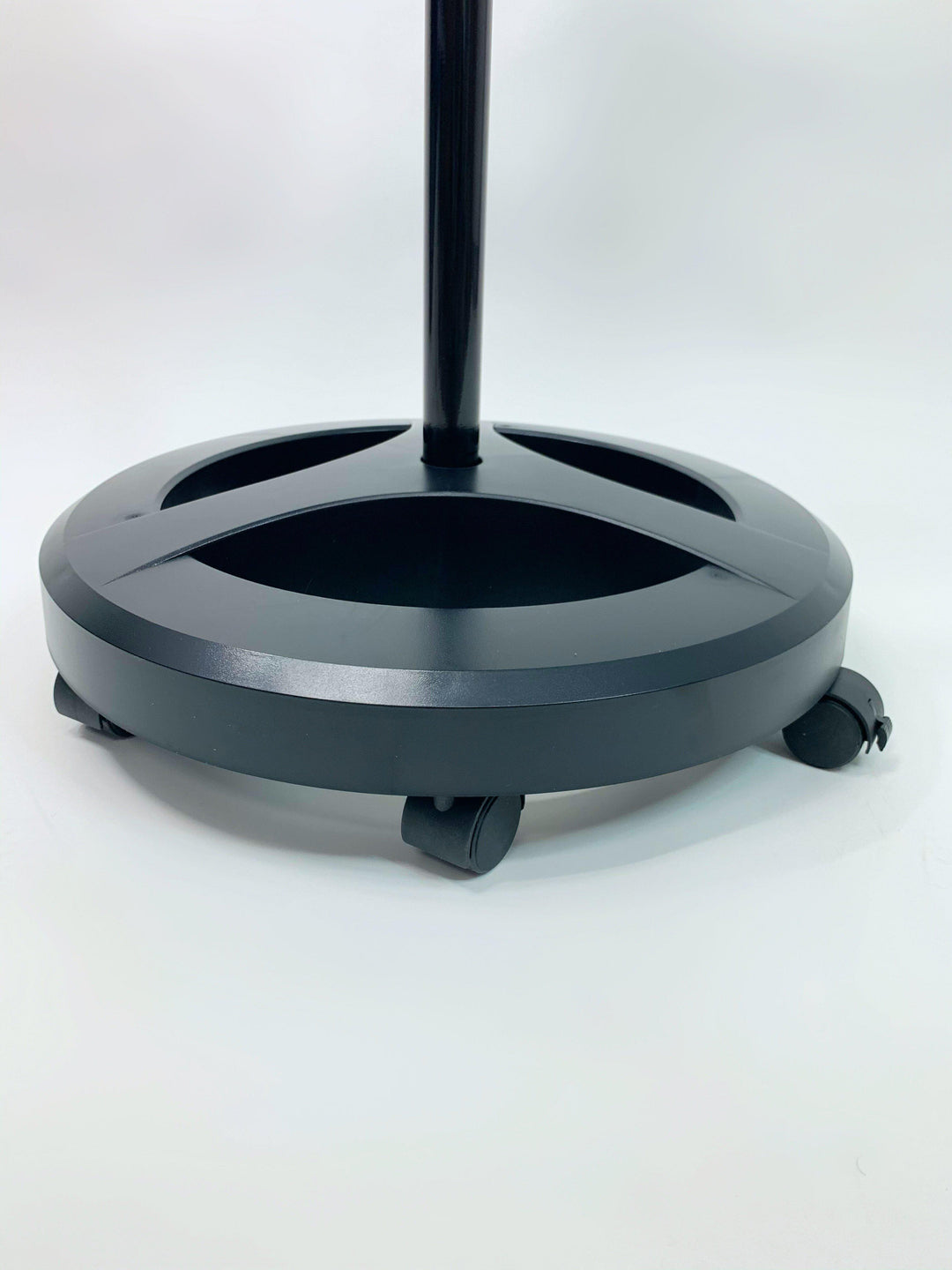 a Lash Light with Storage Tray | Lash Salon Light from Lash Tribe, with a black base on wheels.