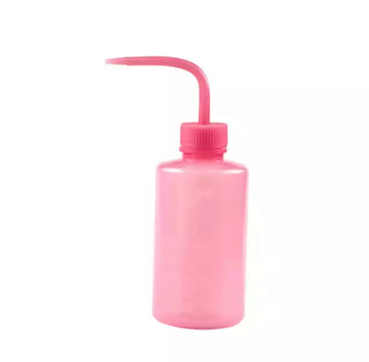 a pink Lash Tribe Plastic Squeeze Water Bottle with a handle on a white background.